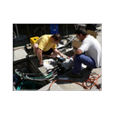 Technicians work with fiber optics